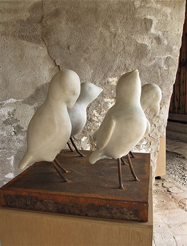 Fyra vita fåglar